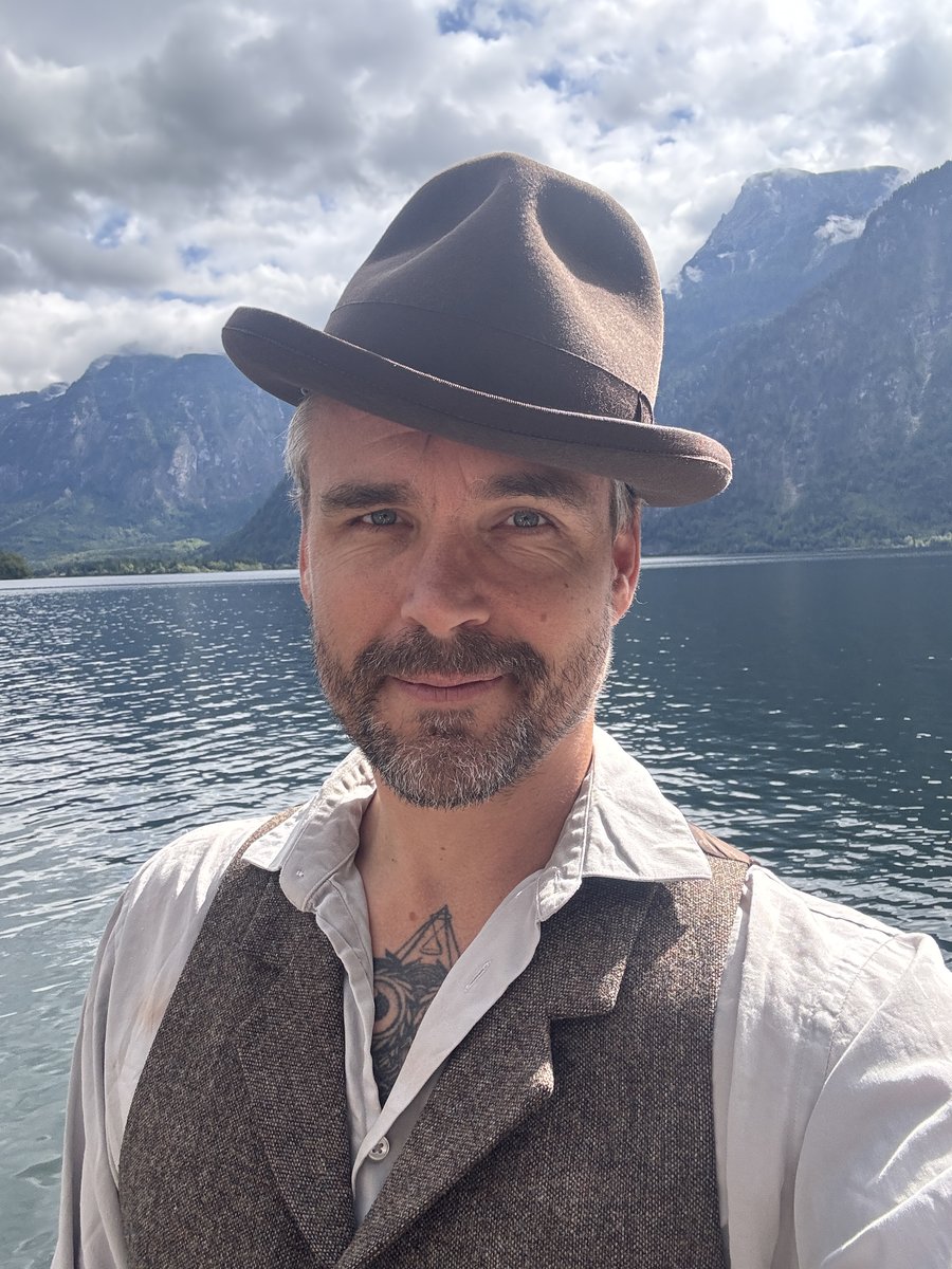Charlie Caper by a lake in the mountains near Bad Aussee